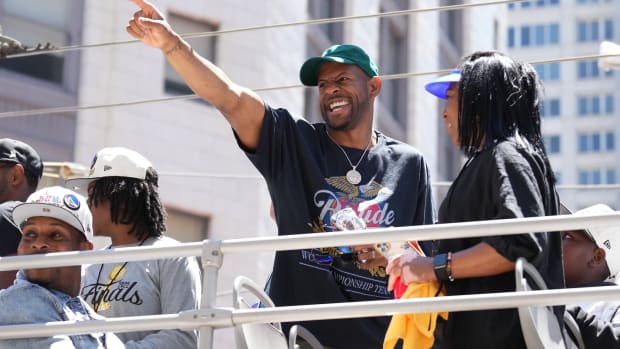Jun 20, 2022; San Francisco, CA, USA; Golden State Warriors forward Andre Iguodala gestures during the Golden State Warriors championship parade in downtown San Francisco. Mandatory Credit: Darren Yamashita-USA TODAY Sports